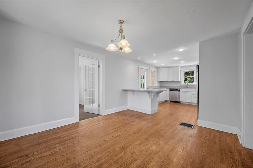 464 Franklin Street Slippery Rock, PA 16057 - Photo 18 of 45 a view of an empty room with kitchen and window