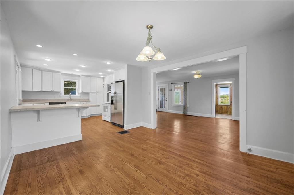 464 Franklin Street Slippery Rock, PA 16057 - Photo 19 of 45 a view of a kitchen with granite countertop stainless steel appliances refrigerator and microwave