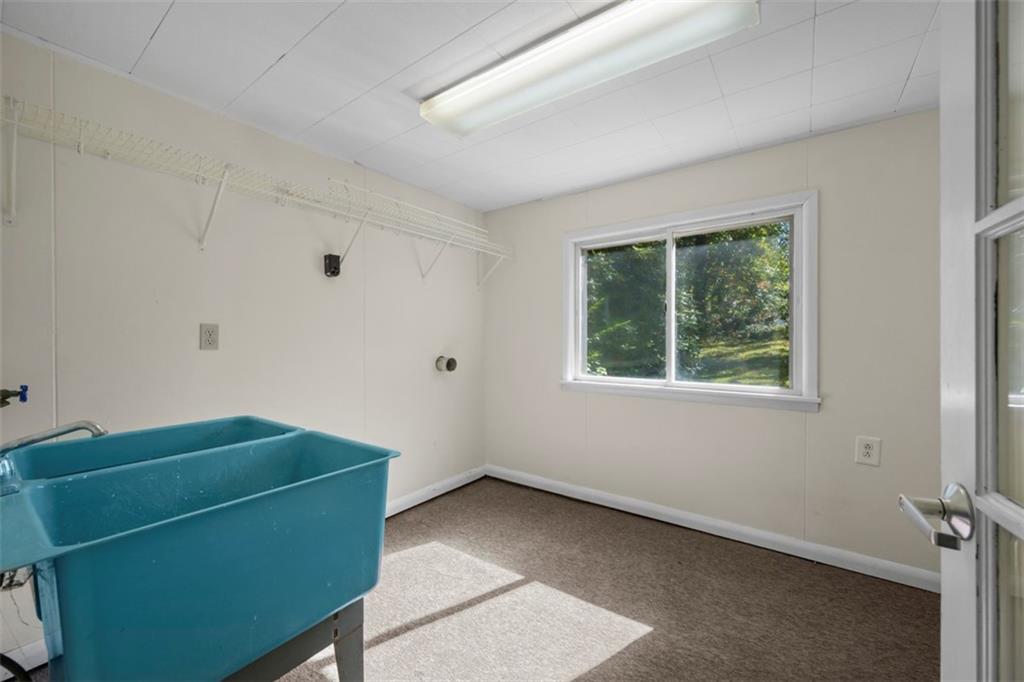 464 Franklin Street Slippery Rock, PA 16057 - Photo 21 of 45 an empty room with a window and a fan