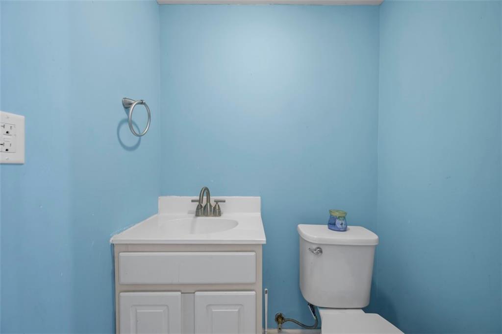 464 Franklin Street Slippery Rock, PA 16057 - Photo 22 of 45 a bathroom with a toilet sink and mirror