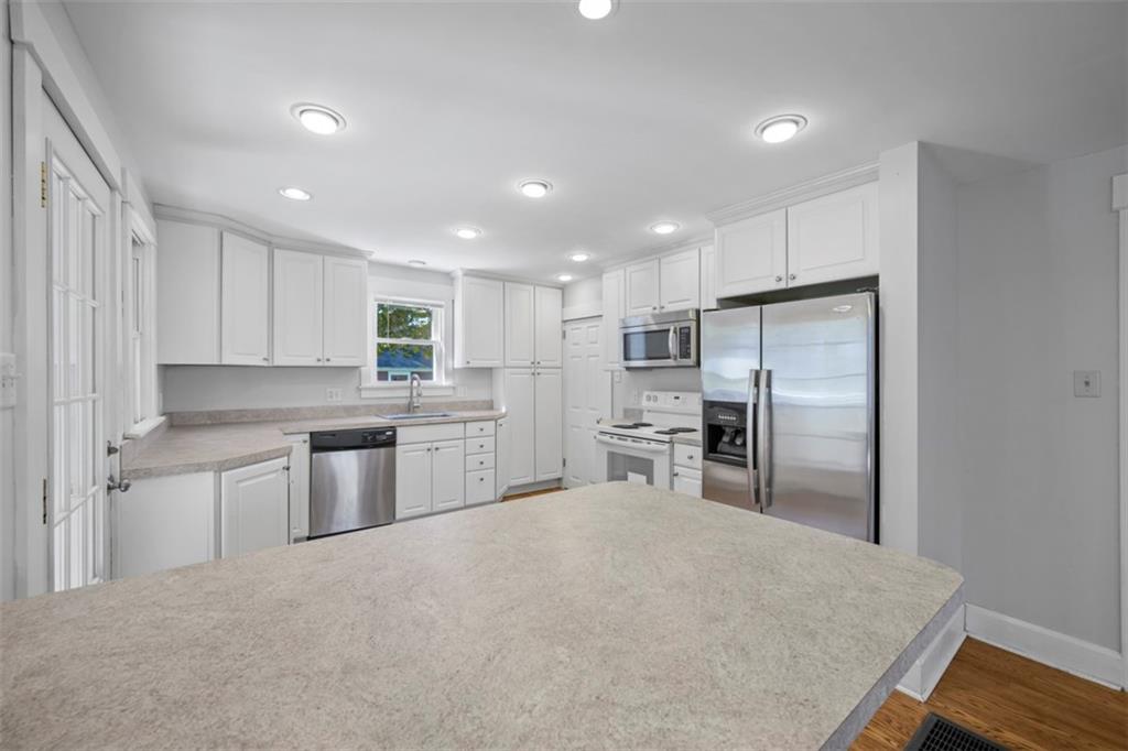 464 Franklin Street Slippery Rock, PA 16057 - Photo 25 of 45 a kitchen with refrigerator and chairs