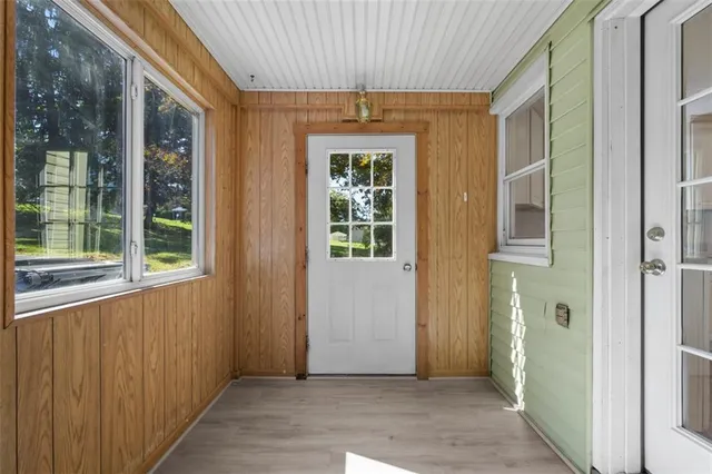 a view of a hallway with toilet