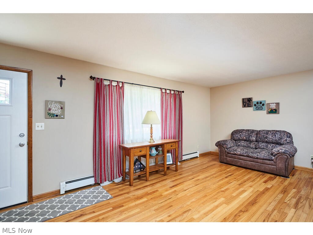 2937 Greenridge Road Barberton, OH 44203 - Photo 3 of 17 Enter into a spacious living room with hardwood floors