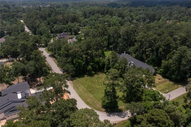 an aerial view of residential house with outdoor space