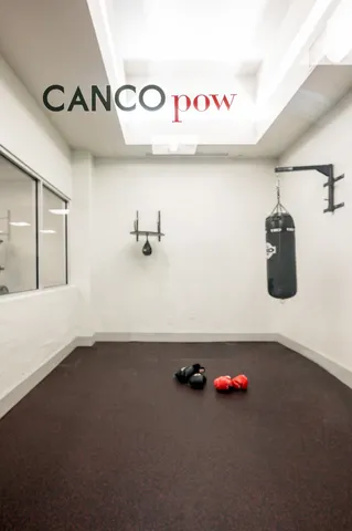 an outdoor space with furniture and umbrella