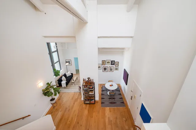 a view of a workspace with furniture