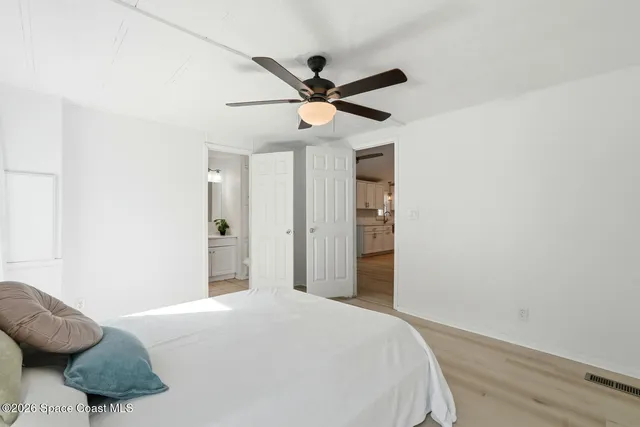 a bathroom with a sink toilet and mirror