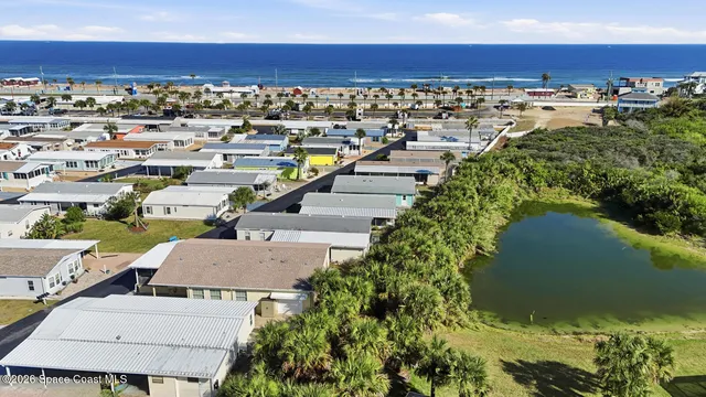 a view of a hardwood floor and staircase
