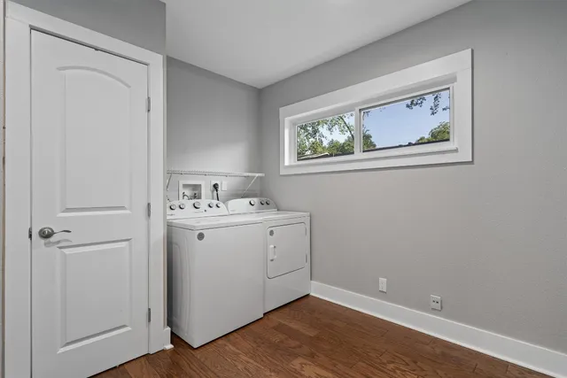 a bathroom with a sink a toilet and a shower