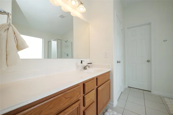 a view of a storage & utility room with washing machine