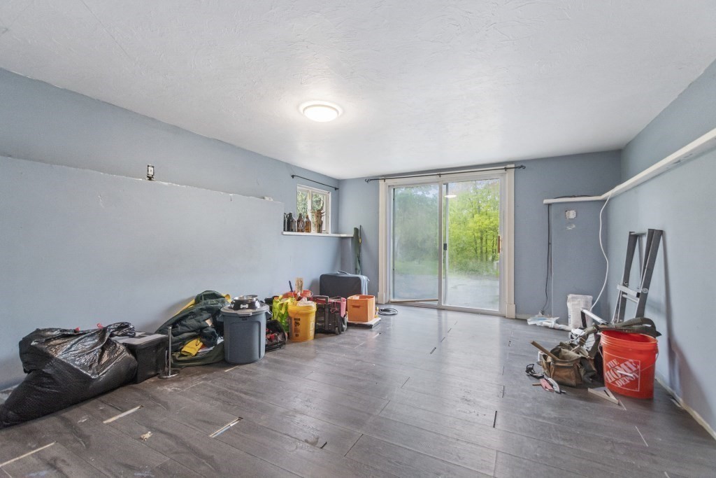 10 Marcius Road Worcester, MA 01607 - Photo 7 of 19 a living room with furniture and a wooden floor