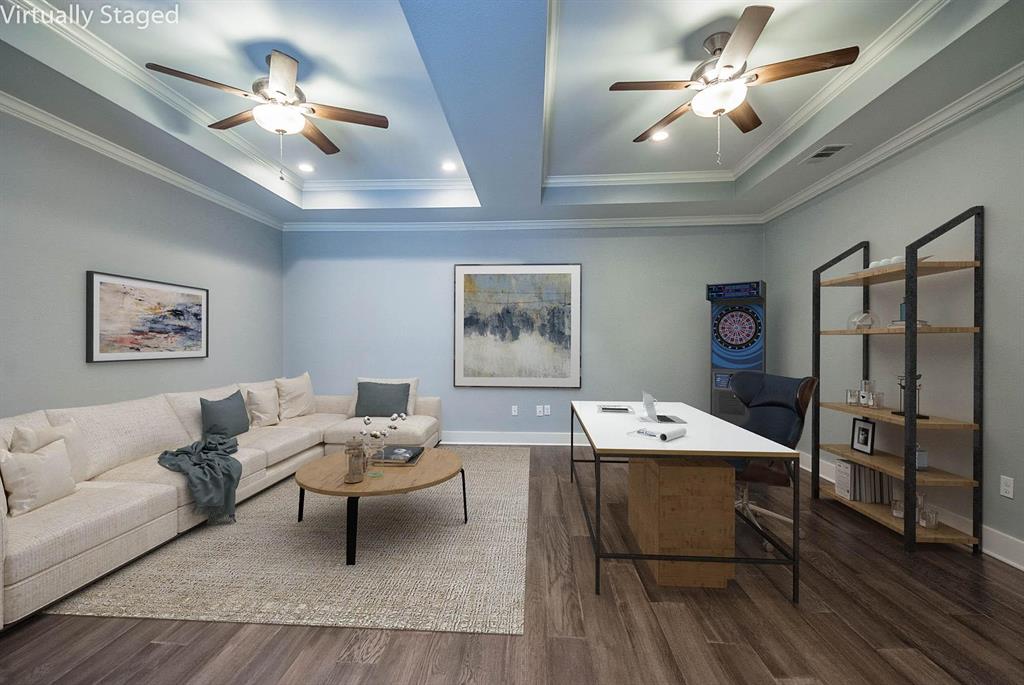 11224 Jamestown Road Dallas, TX 75230 - Photo 16 of 40 a living room with furniture a chandelier and a window