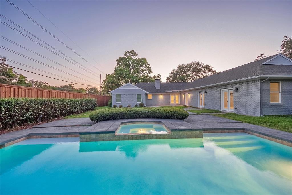 11224 Jamestown Road Dallas, TX 75230 - Photo 34 of 40 a front view of house with yard and green space