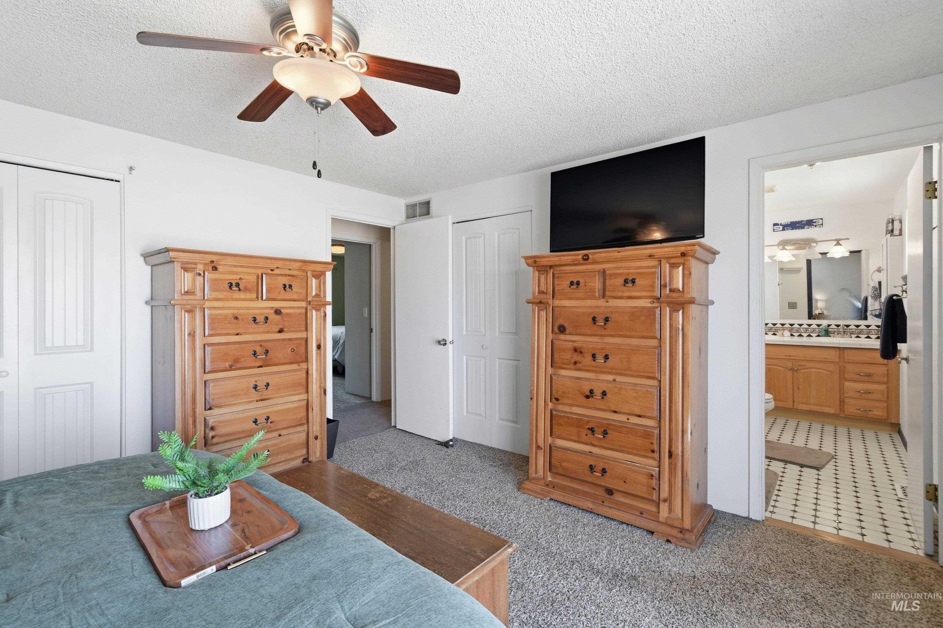 15095 David Street Caldwell, ID 83607 - Photo 21 of 39 Plush carpet flooring complements the light wall tones