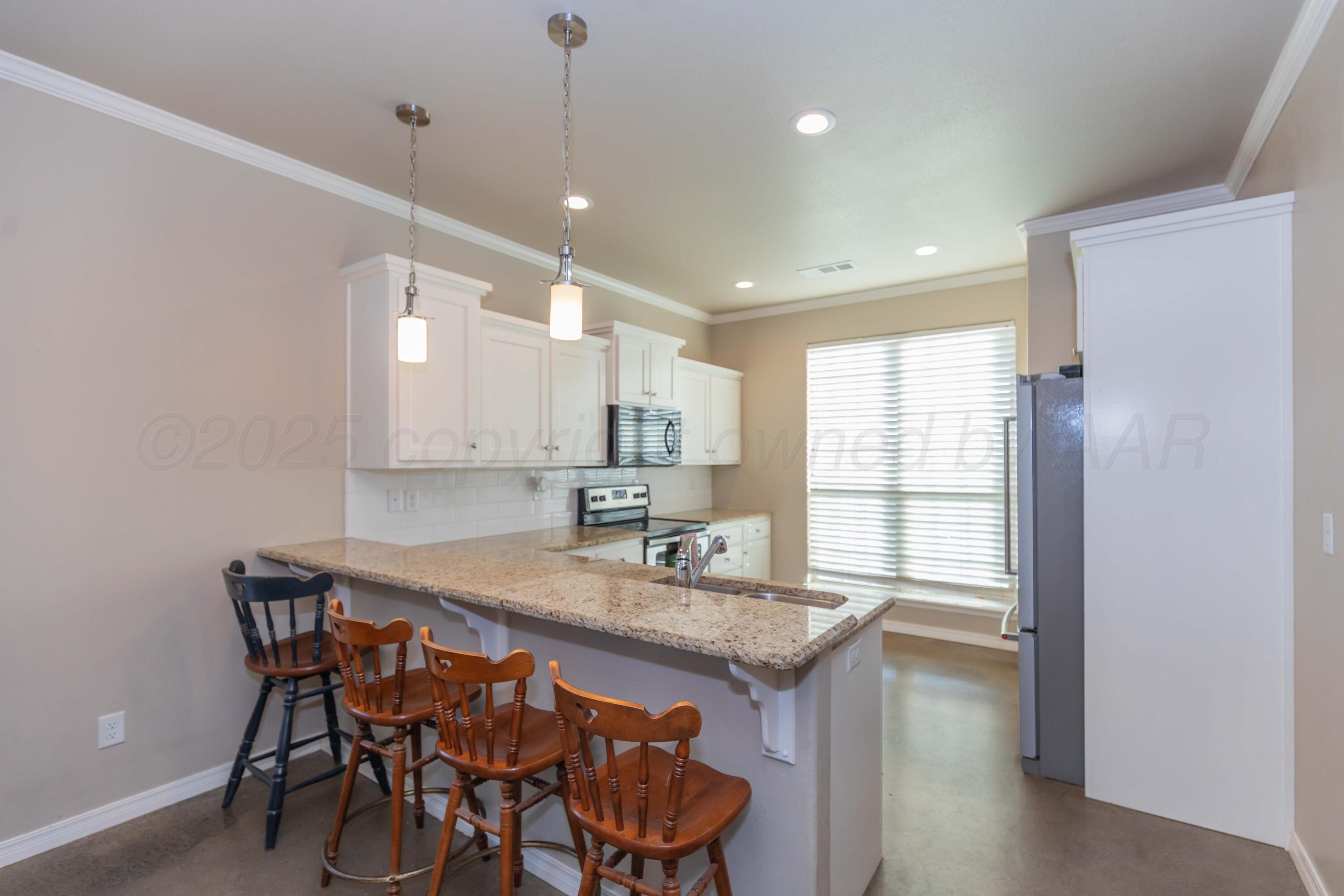 5050 South Blessen Road Amarillo, TX 79119 - Photo 6 of 40 KITCHEN VIEW 1