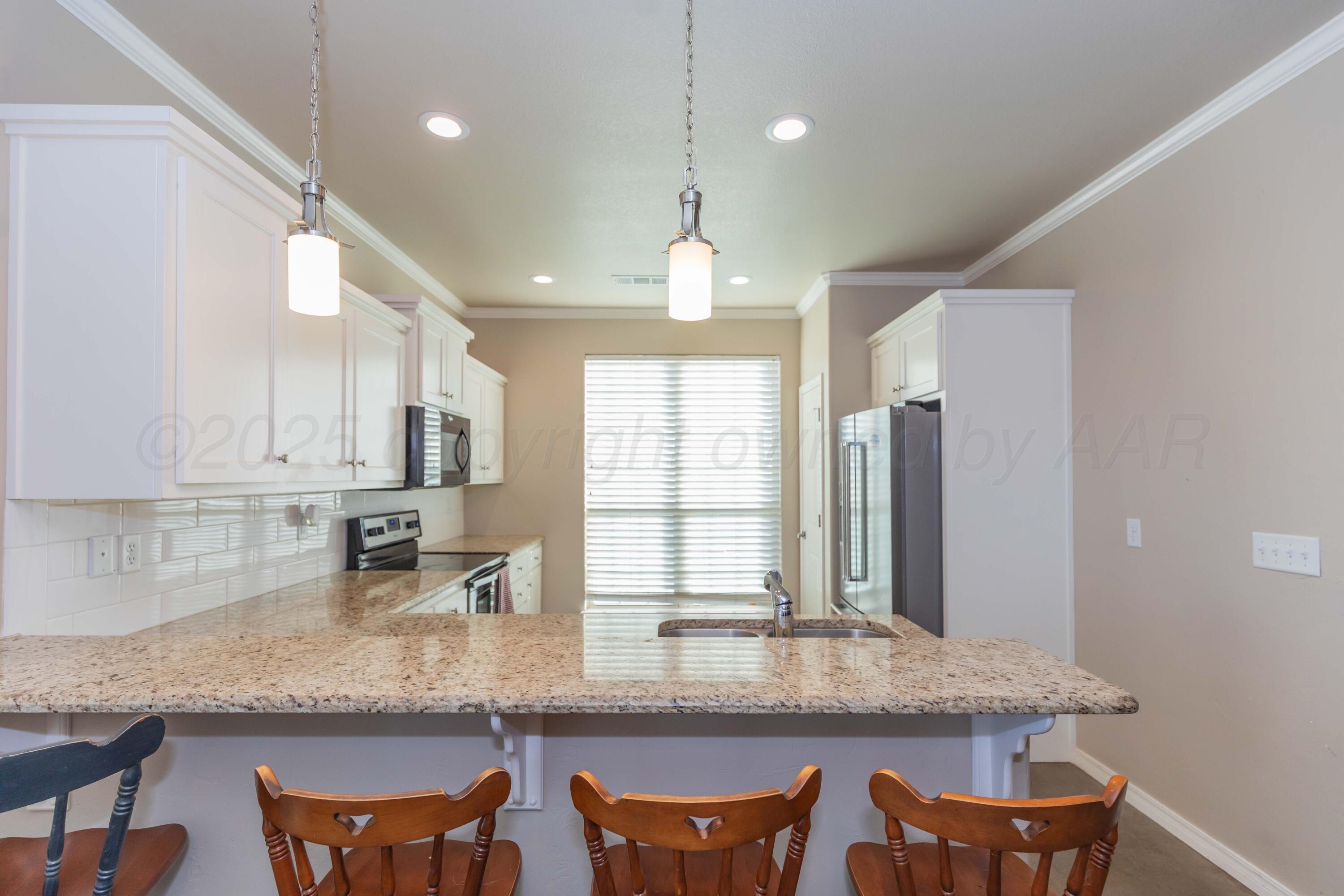 5050 South Blessen Road Amarillo, TX 79119 - Photo 7 of 40 KITCHEN VIEW 2