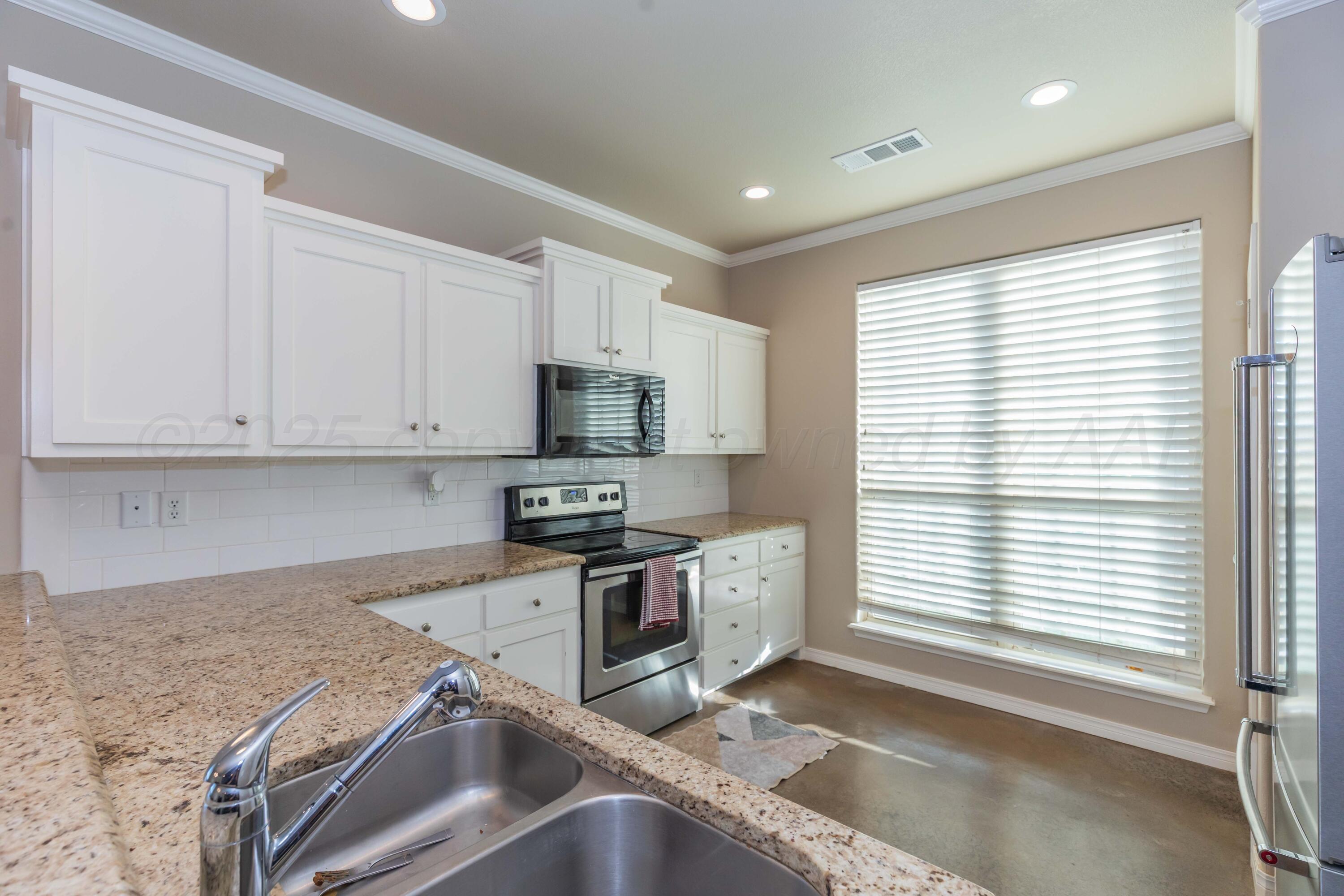 5050 South Blessen Road Amarillo, TX 79119 - Photo 8 of 40 KITCHEN VIEW 3