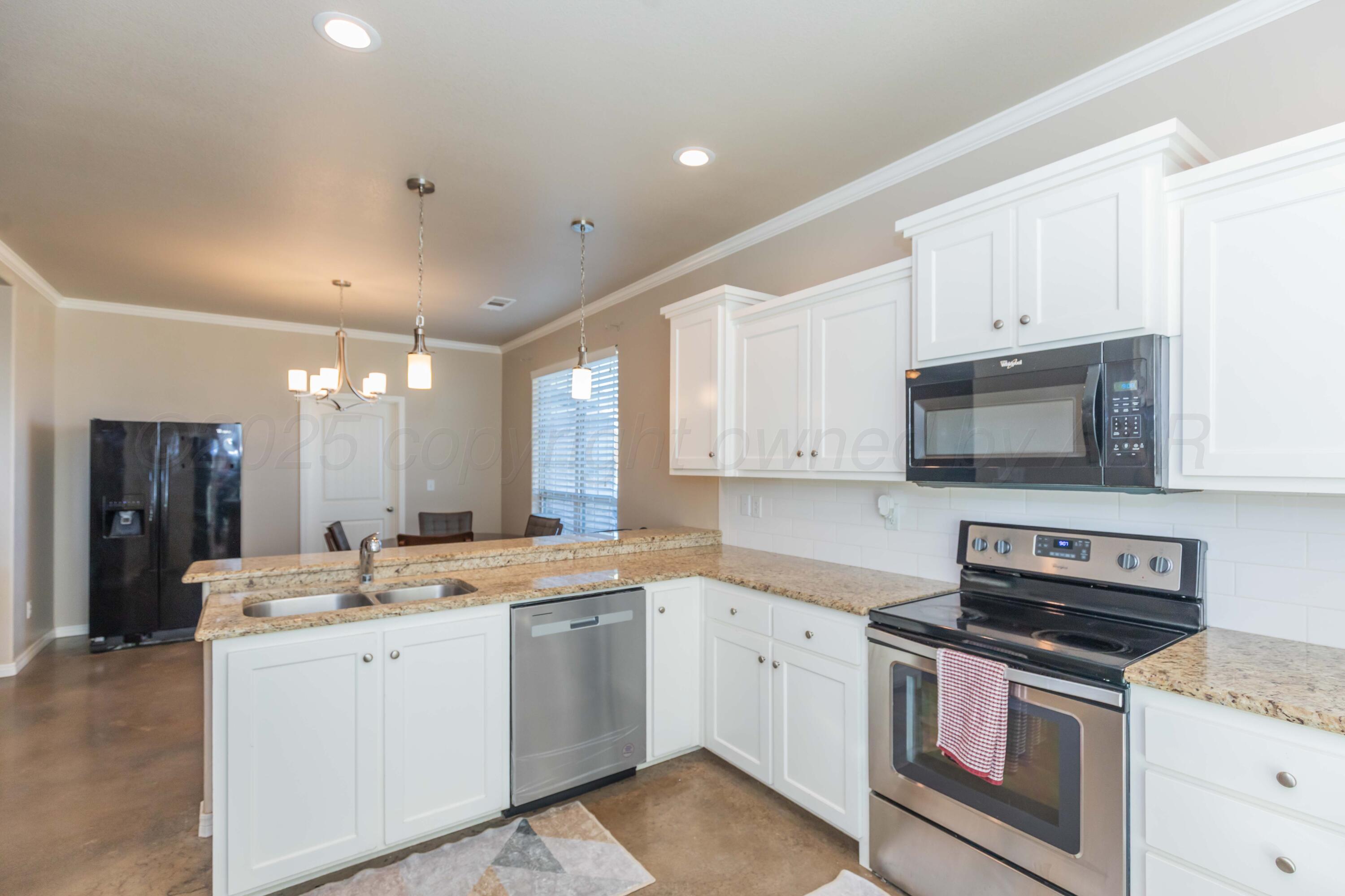 5050 South Blessen Road Amarillo, TX 79119 - Photo 9 of 40 KITCHEN VIEW 4