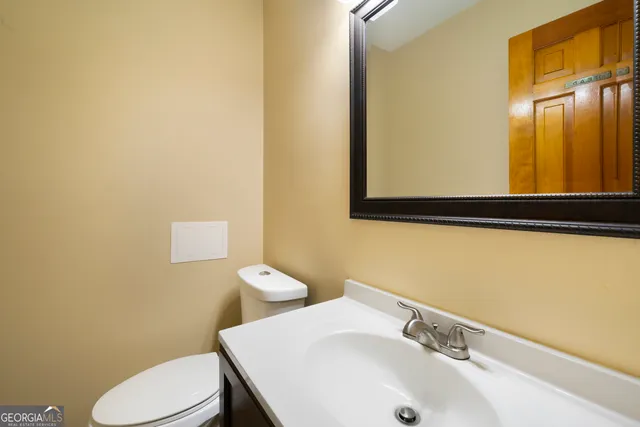 a bathroom with a sink and a toilet