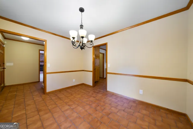 a view of a livingroom with wooden floor