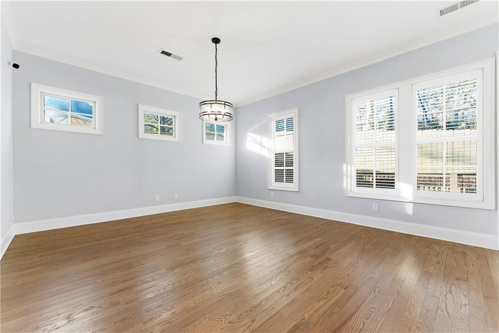 2131 Bellrick Road Northwest Atlanta, GA 30318 - Photo 19 of 57 a view of an empty room with windows