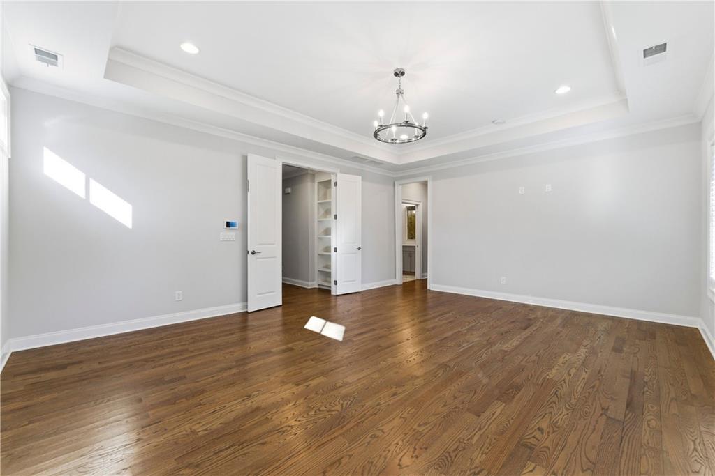 2131 Bellrick Road Northwest Atlanta, GA 30318 - Photo 30 of 57 a view of an empty room with wooden floor