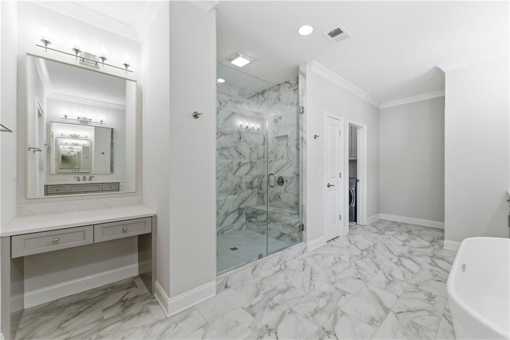 2131 Bellrick Road Northwest Atlanta, GA 30318 - Photo 32 of 57 a bathroom with a sink and a mirror
