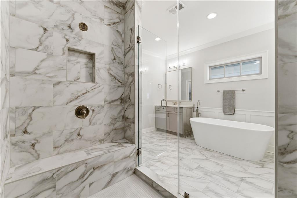2131 Bellrick Road Northwest Atlanta, GA 30318 - Photo 36 of 57 a bathroom with a bathtub and a shower