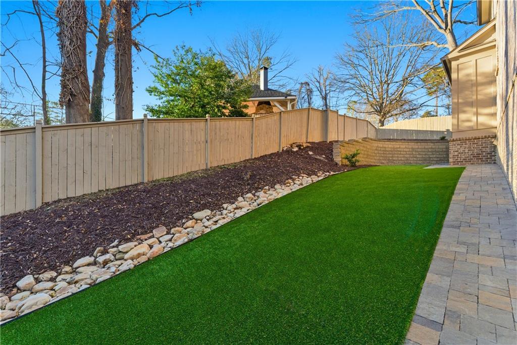 2131 Bellrick Road Northwest Atlanta, GA 30318 - Photo 47 of 57 a view of a backyard with wooden fence