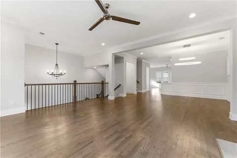 a view interior of a house wooden floor and an entryway