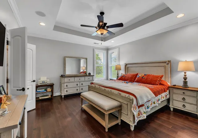 a bedroom with a bed and furniture