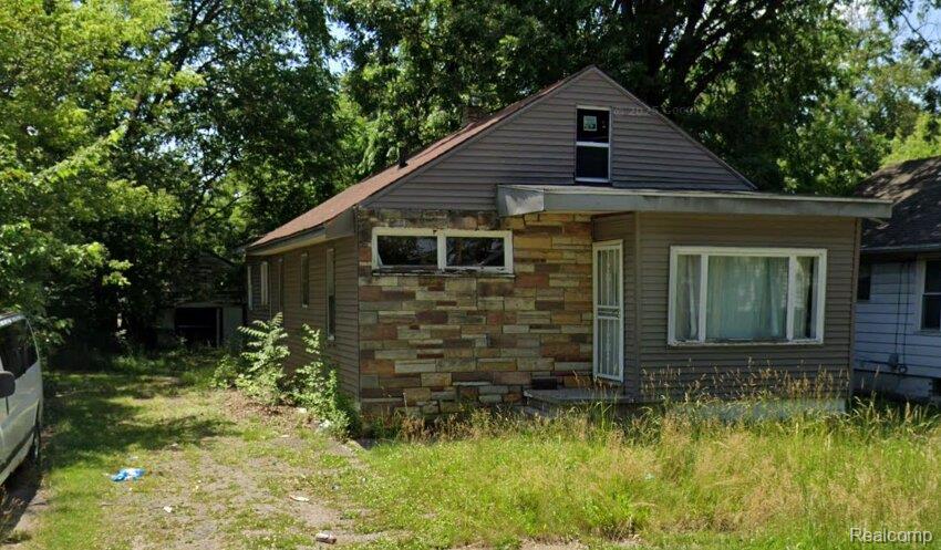 1610 Kent Street Flint, MI 48503 - Photo 2 of 11 View of front of house with stone siding