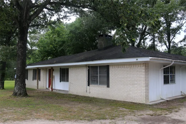 a front view of a house with a garage