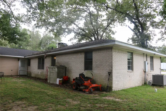 a front view of house with yard and seating area