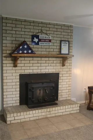 a stove top oven sitting inside of a kitchen