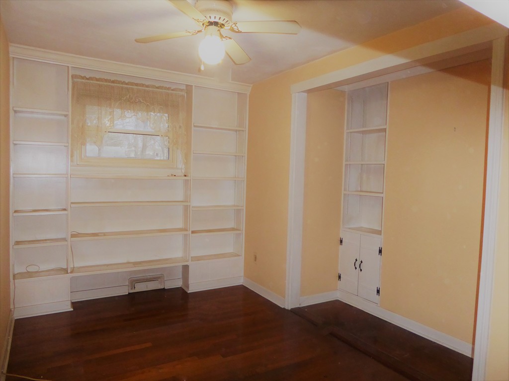 100 Hudson Street Springfield, MA 01118 - Photo 10 of 30 wooden floor in an empty room