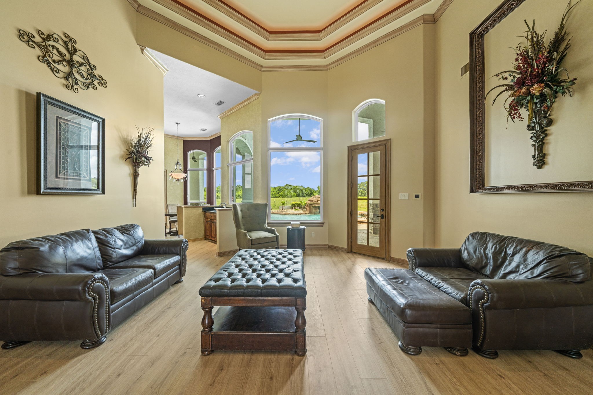 18732 Kz Road Cypress, TX 77433 - Photo 10 of 49 Steps from the main living area, a cozy secondary lounge provides the perfect, intimate spot to chat and relax with family.