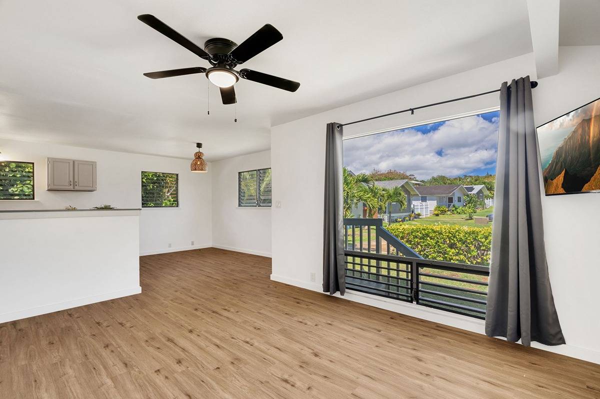 4920 Aliali Road, Unit 11 Kapaa, HI 96746 - Photo 6 of 30 a view of empty room with wooden floor and fan