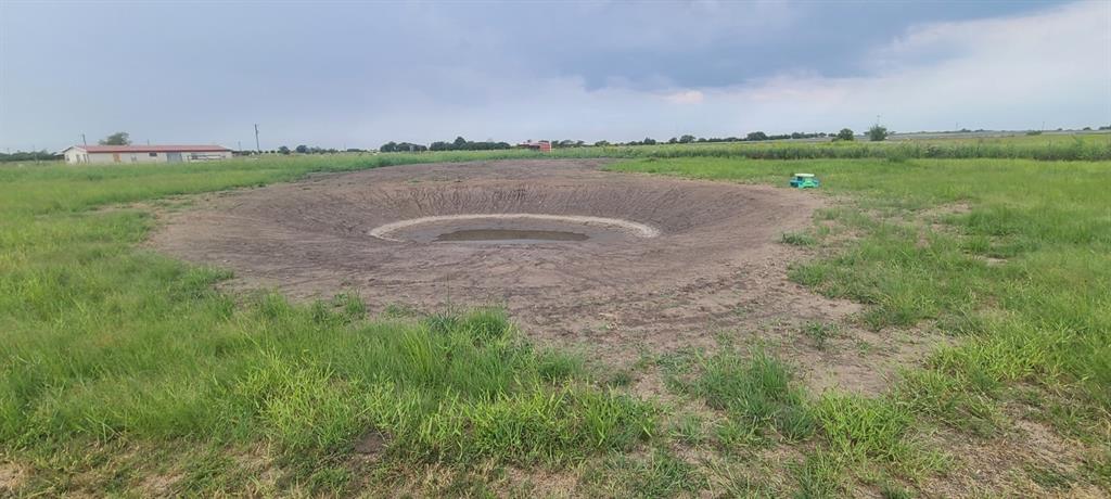1589 Stiles Road Whitesboro, TX 76273 - Photo 22 of 22 a view of outdoor space with green field and trees