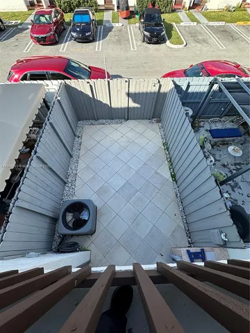 a bathroom with a tub and toilet