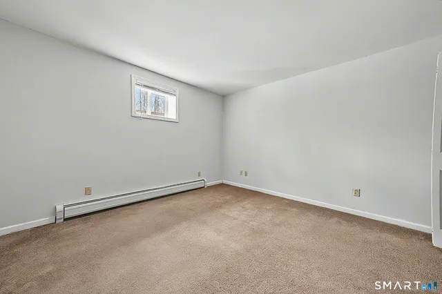 an empty room with a workbench