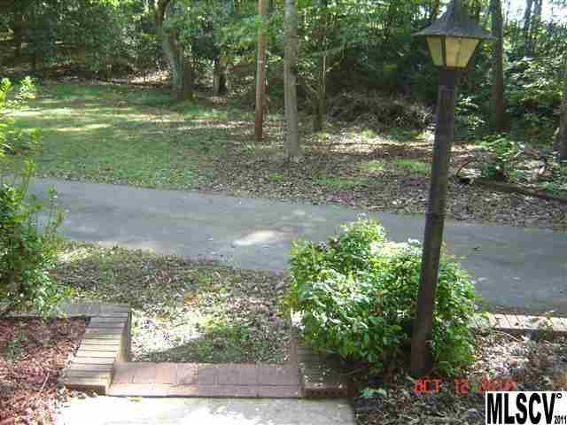 4122 Beach Road Hudson, NC 28638 - Photo 12 of 20 a backyard of a house with lots of green space
