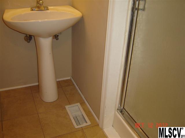 4122 Beach Road Hudson, NC 28638 - Photo 20 of 20 a bathroom with a sink