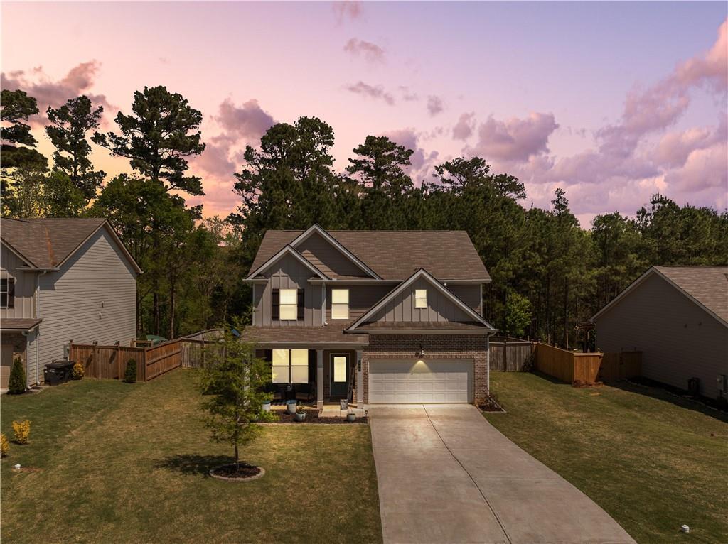 405 Crowley Drive Calhoun, GA 30701 - Photo 1 of 33 a view of a white house with a yard