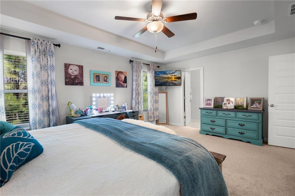405 Crowley Drive Calhoun, GA 30701 - Photo 21 of 33 a bedroom with a bed dresser and a window