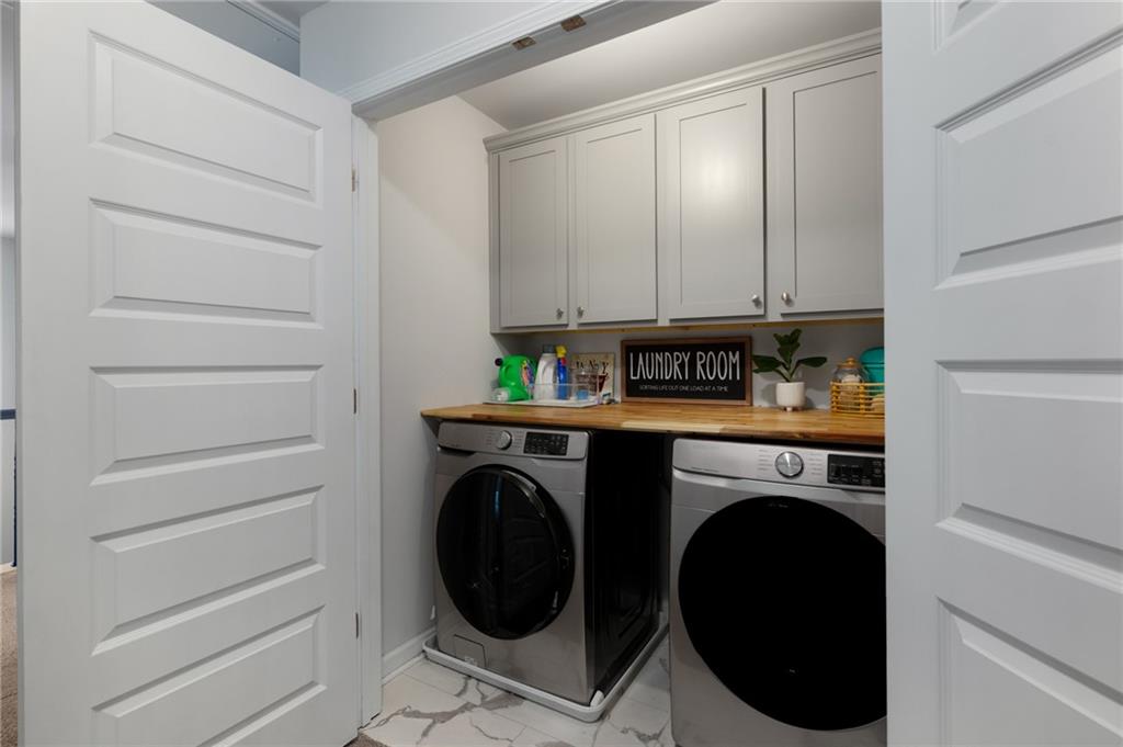 405 Crowley Drive Calhoun, GA 30701 - Photo 27 of 33 a utility room with dryer and washer