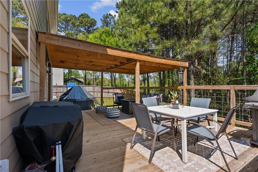 405 Crowley Drive Calhoun, GA 30701 - Photo 29 of 33 a outdoor space with furniture and garden view