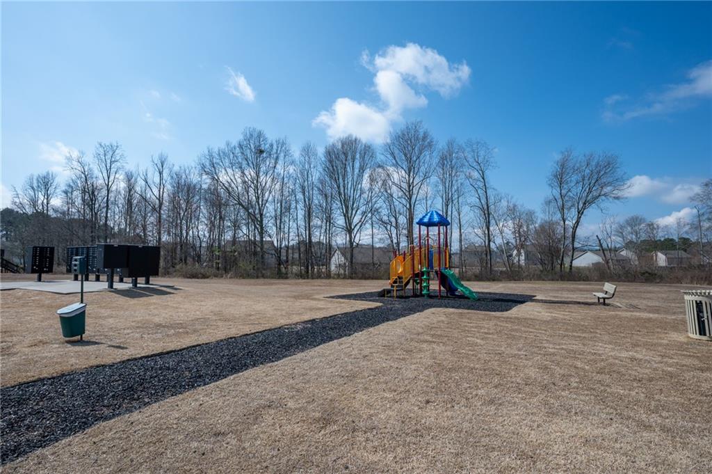 405 Crowley Drive Calhoun, GA 30701 - Photo 32 of 33 a view of a park with swings and slides