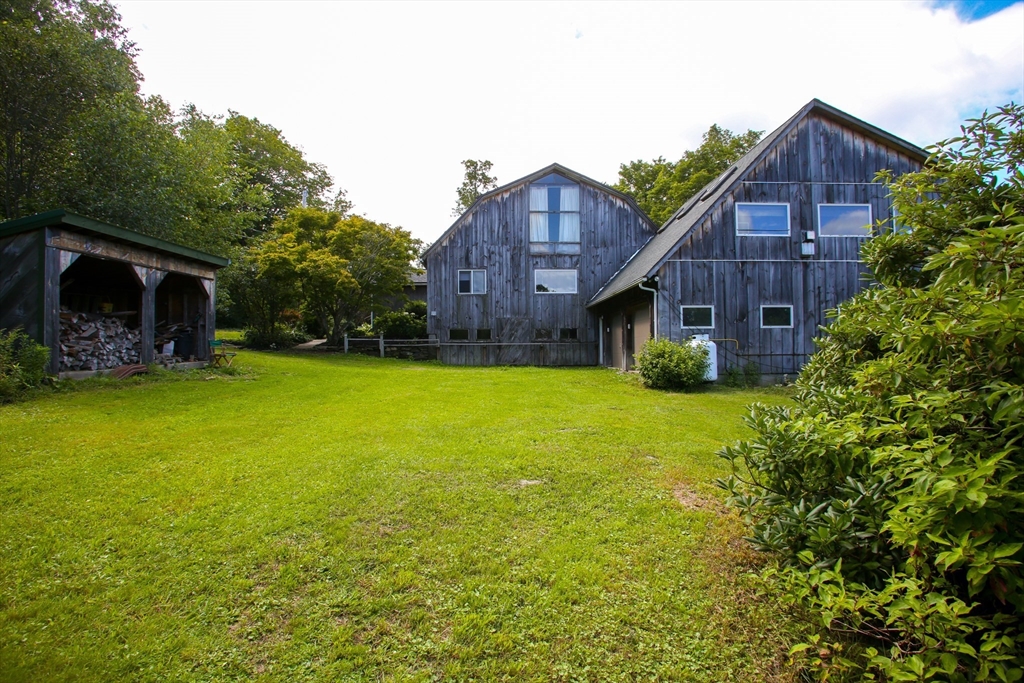 14 S Road Heath, MA 01346 - Photo 34 of 38 a view of a house with a yard and sitting area