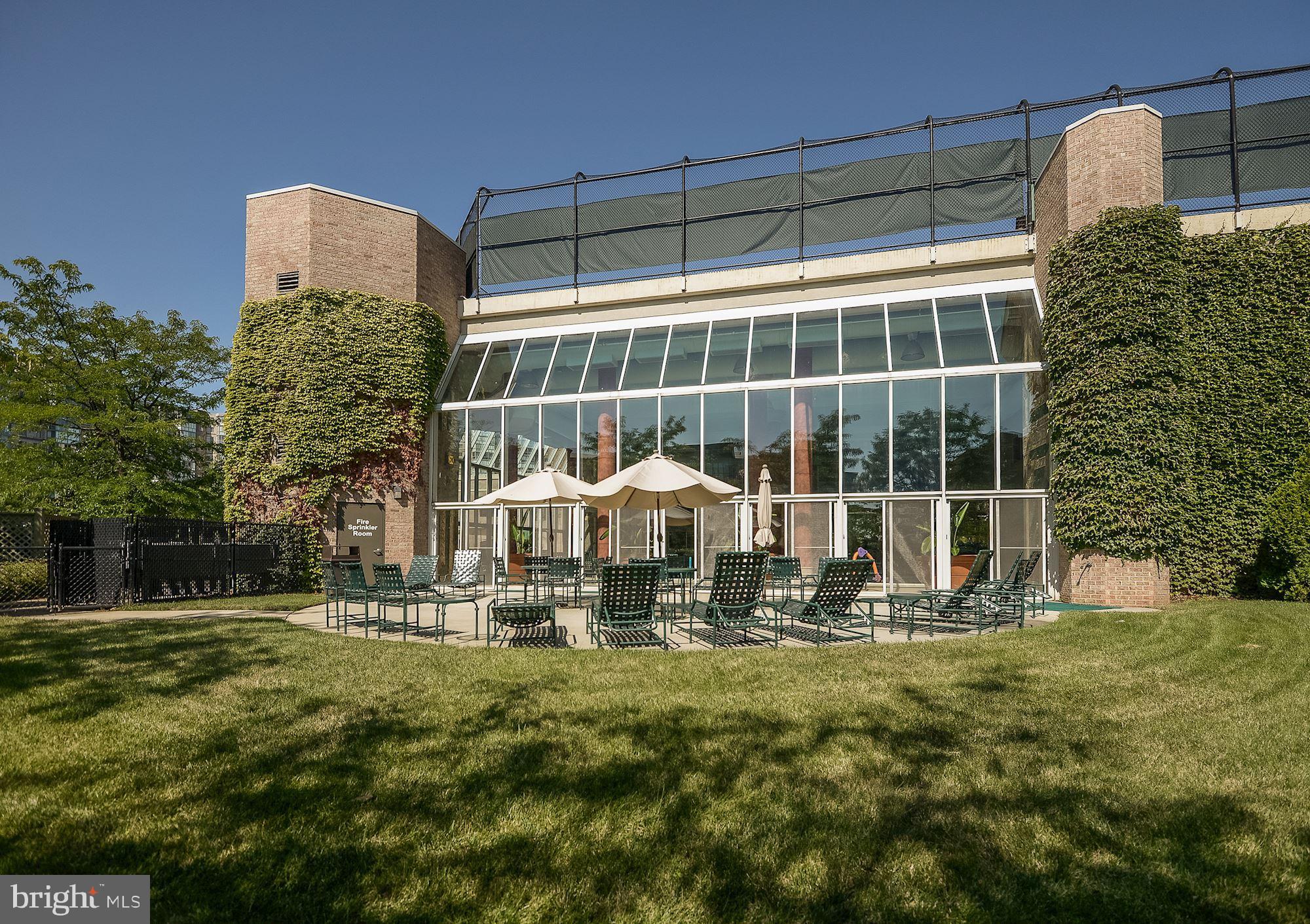 19375 Cypress Ridge Terrace, Unit 922 Leesburg, VA 20176 - Photo 58 of 89 Outdoor sundeck off pool